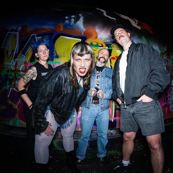 a926f5a89f429fb1_Split_Dogs__Live_+_Signing.webp
